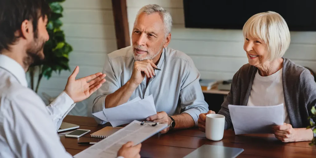 Older man and parent speaking to probate solicitor. Inheritance tax: Understanding Nil-Rate Bands