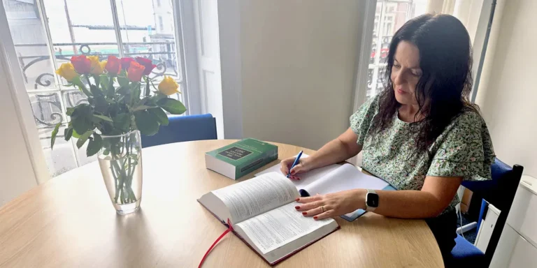 Cherise, Solicitor at Nantes, working at her desk in Dorset, representing her 25 years in practice and reflections on the future of family law and dispute resolution.