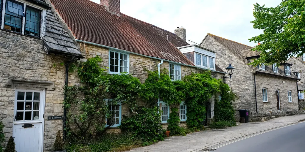 Traditional Dorset stone cottage representing second home ownership and property law advice from Nantes Solicitors.